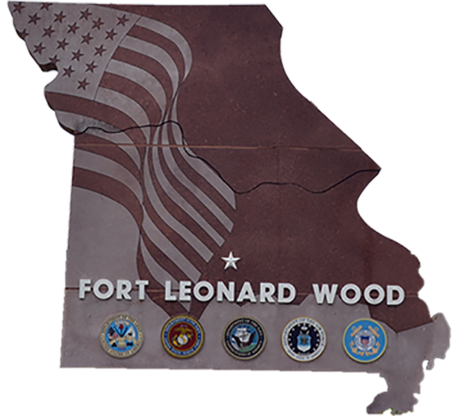 The sign that is by the front gate of Fort Leonard in Missouri. The sign is in the shape of Missouri with Fort Leonard Wood written on it. Below the wording is the different regimental crests for the units on Fort Leonard Wood.